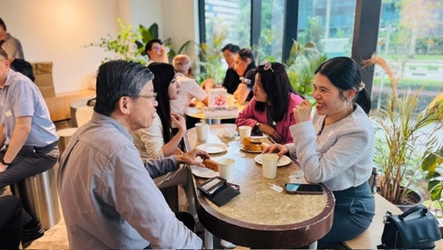 Business owners networking over coffee
